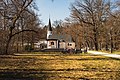 * Nomination: The monastery Maria Eich. On the benches in front of it are people --FlocciNivis 09:39, 21 October 2022 (UTC) * Review  Comment The light is a bit too harsh ont the white woman and on the way. --Sebring12Hrs 07:51, 24 October 2022 (UTC)  Done adjusted the harsh lighting --FlocciNivis 17:37, 24 October 2022 (UTC)