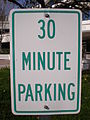 A 30 minute parking sign.