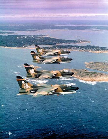 A-7 Corsair II aircraft of the Iowa Air National Guard (tail code IA) and South Dakota Air National Guard (tail code SD) during Crested Cap exercises, 1979 A-7D Corsair IIs of the 124th Tactical Fighter Squadron and 175th Tactical Fighter Squadrons fly in formation during NATO exercise.jpg