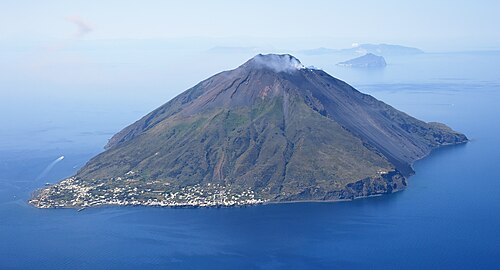 Aerial image of Stromboli containing Mount Stromboli, one of the four active volcanoes in Italy.