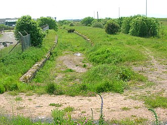 The remains of the station from the site of the old roadbridge in 2009. Ardrossan North station site.JPG