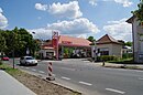 Opel-Zentrale mit Tankstelle und Garage, Hauptgebäude mit Überdachung, linkem und rechtem Pavillon, Garagentrakt und Werkstattgebäude