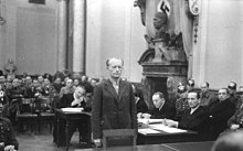 Adolf Reichwein before a Nazi People's Court. He was a victim of judicial murder after a show trial. Bundesarchiv Bild 151-11-29, Volksgerichtshof, Adolf Reichwein.jpg
