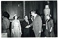 Carl Albert, Queen Elizabeth, and Prince Phillip shaking hands with other people during a visit to the U.S.jpg