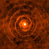 Atacama Large Millimeter Array image of LL Pegasi Celestial spiral with a twist.jpg