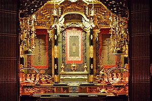 Close-up view of the inner altar with the painted scroll of the Buddha