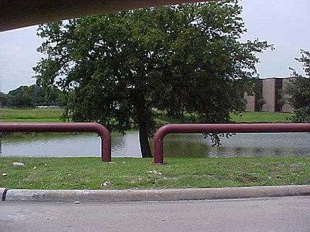 The Corporate Park retention basin in Stafford, Texas, United States