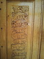 Wooden doors with "Ave Maria" carving in different languages