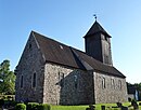 Dorfkirche und Kirchhofsmauer sowie Grabkreuz, Leichenwagenhalle und Kriegerdenkmal