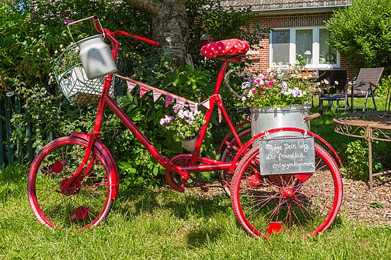 Decorated women's bike of a farm shop near Oevenum on Föhr