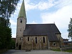 Catholic branch church hl.  George and churchyard with walling