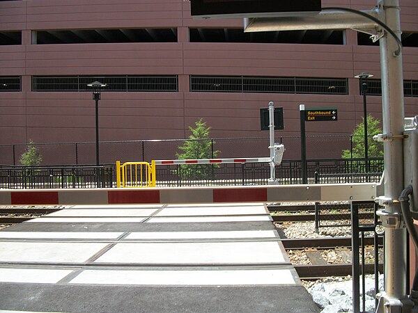 Safety features at stations include bells, gates, and LED displays