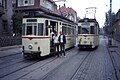 Gotha trams . Triebwagen nr 46 and 47 crossing in Gotha on Linie 2 with their tram drivers, Aug 1989 - Flickr - sludgegulper.jpg