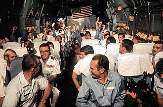 American POWs recently released from North Vietnamese prison camps, 1973 Hanoi-taxi-march1973.jpg
