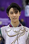 Yuzuru Hanyu at the men's flower ceremony of the 2018 Winter Olympics