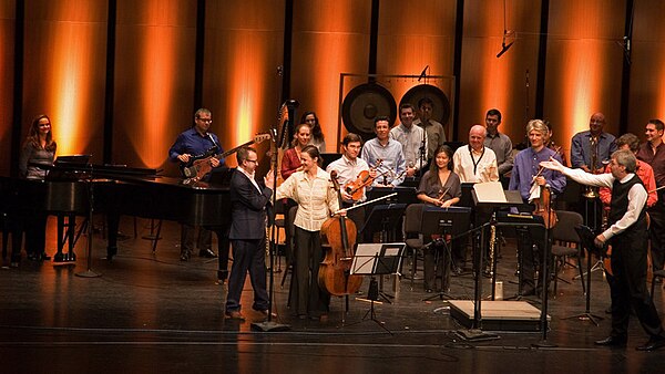 Performers on the Harris Theater's stage