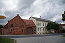 Homestead, consisting of a residential building, side gatehouses, two stable buildings and a barn