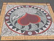 Mosaic sidewalk art on East Hastings Street, depicting a heart and the Community "The Heart of the City"