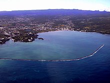 Hilo Bay and the town of Hilo, Hawaii with breakwater completed in 1929