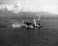 Task Force 38 aircraft attack the Japanese battleship HIJMS Musashi (foreground) and a destroyer in the Sibuyan Sea (24 October 1944)