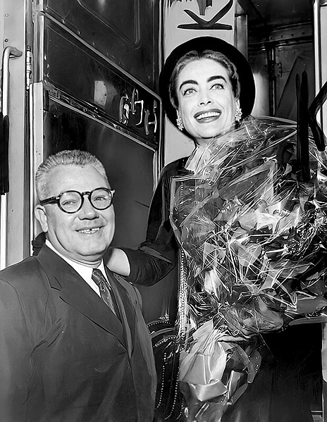 Joan Crawford and Alfred Steele returning from their European honeymoon on August 1, 1955.