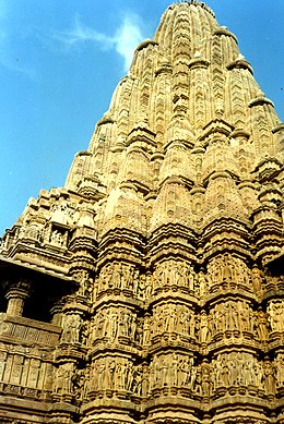 Kandariya Mahadeva Temple (c. 1030), Khajuraho, India, is an example of religious architecture with a fractal-like structure which has many parts that resemble the whole. Kandariya mahadeva temple.jpg