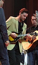 Steven Page, Kevin Hearn and Ed Robertson live in 2005 Kevin Hearn with fellow Barenaked Ladies, Steven Page (left) and Ed Robertson (right).jpg