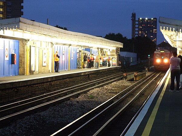 Latimer Road Tube Station with Trellick Tower in the background.