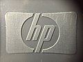 Macro photo of HP logo inside back of HP-30B calculator (26933017923).jpg