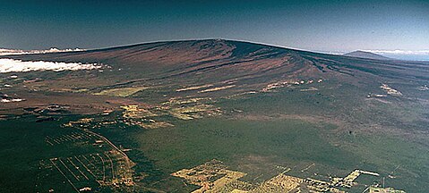 Mauna Loa as seen from the air. Hualālai is visible in the background