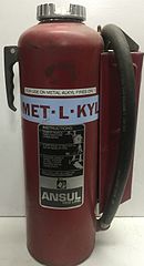 Met-L-Kyl cartridge-operated fire extinguisher for pyrophoric liquid fires