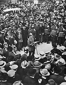 A Berlin crowd listens as a German officer reads Wilhelm II's order for mobilisation, 1 August 1914. Mobilization order is read out in Berlin, 1 August 1914.jpg