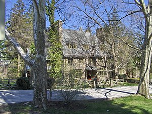 Cotswold-style house at 300-04 West Willow Grove Avenue, in the Chestnut Hill section of Philadelphia, Pennsylvania (1913), Duhring, Okie & Ziegler, architects. MtAiryHouse.jpg