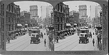 Stereoscope card showing the business district on Peachtree Street ca. 1907. The Mitchells' new home was about 3 miles from here.[35]