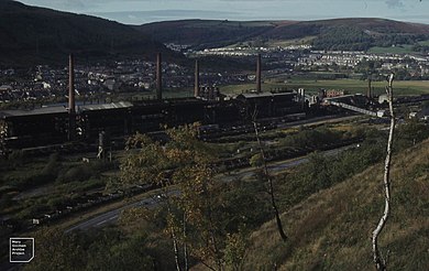 Phurnacite smokeless fuel factory (1984) Phurnacite Works. Cwmammon from tip scheduled to be moved. Mountain Ash. 23.10.1984 (33715578565).jpg