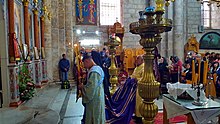 Christians worshipping the Divine Liturgy St George Church in the city of Lod PikiWiki Israel 67507 st. georgs church in lod.jpg