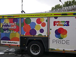 Detail of the locker wrapping on Humberside Fire and Rescue's DH23P4, on display at Pride in Hull 2022 to advertise that fire does not, in fact, discriminate against the LGBTQ+ community.