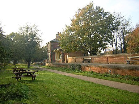 Rayne railway station by John V Nicholls