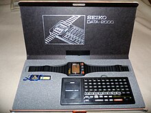 Seiko Data-2000 with docking station, 1984 Seiko Data-2000, The First Computer Watch, Circa 1983-1984, LCD Watch with Docking Station (8515983575).jpg