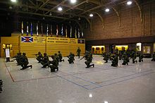 Canadian soldiers undertake weapons training in a drill hall in January 2007. Soldiers of The Cameron Highlanders of Ottawa - Weapons Training in Drill Hall.JPG