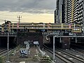 The station building and entrance seen from South Yarra Siding Reserve, July 2024