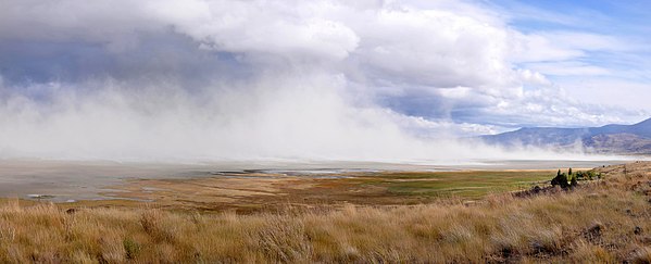 Dust clouds rise above Summer Lake during a September storm in 2013. View is to the southeast. Part of Winter Ridge is visible on the right.