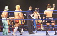 Shisa, along with Akira Tozawa and Kagetora represent Dragon Gate in the 2011 King of Trios tournament, where they faced the Osirian Portal in the quarter-finals. Team Dragon Gate vs. The Osirian Portal.jpg