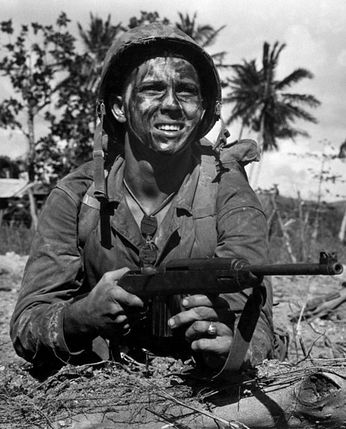 Marine with M1 carbine at Guam