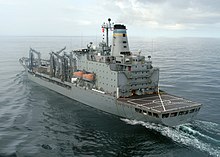 A Fleet Oiler (formerly the Naval Fleet Auxiliary Force) ship, USNS Kanawha, bearing the blue-and-gold stripes on its stack USNS Kanawha T-AO-196.jpg