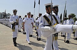 Adm. Gary Roughead, then-U.S. Chief of Naval Operations, at the pavilion of the Navy HQ in 2009. US Navy 090820-N-8273J-056 Chief of Naval Operations (CNO) Adm. Gary Roughead, middle, inspects Pakistan Navy sailors during a welcoming ceremony at Pakistan Naval Headquarters.jpg