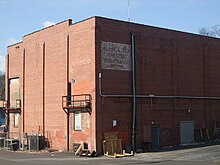 View from behind the building showing the "Euclid Theatre Entrance" sign VarietyPlayhouseAtlantaSoutheastCorner.JPG