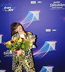 Viki Gabor with the winner's trophy. Viki Gabor - winner of JESC 2019.jpg