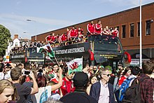 The Wales football team arriving back in Wales after reaching the semi-finals of Euro 2016. Wales Homecoming Parade in Riverside (28153728576).jpg