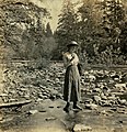 A woman on the Salmon River in Welches c. 1915